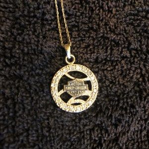Harley Davidson necklace and diamond pendant.